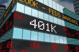 نمایش عدد 401K و نمادهای ارز در تابلوی دیجیتال یک ساختمان تجاری